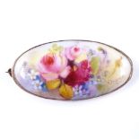 A Royal Worcester oval porcelain panel brooch, in 9ct gold frame, signed H Murcin, length 39.6mm,