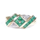 A 9ct gold emerald and diamond dress ring, setting height 8.3mm, size O, 2.5g