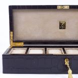 An Aspinal of London leather crocodile skin effect 6-section wristwatch box, with suede inserts,