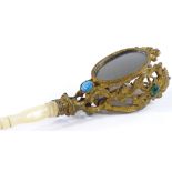 A Victorian gilt-metal posy holder, with inset mirrors and paste stones, and turned mother-of-