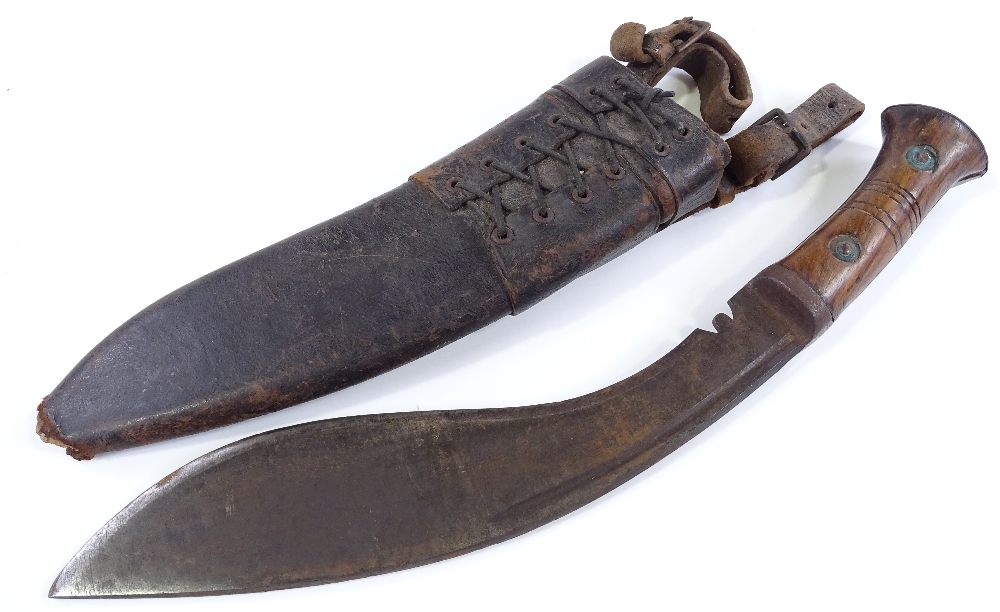 A Second War Period Gurkha Army kukri knife, with original bound leather scabbard