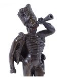 A patinated bronze sculpture of a standing Hussar bugler, late 19th / early 20th century,