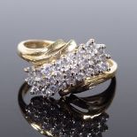 A 14ct gold diamond cluster crossover ring, setting height 11.5mm, size R, 3.5g (1 replacement stone