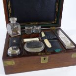 A 19th century brass-bound mahogany gentleman't travelling toilet case, with fitted interior