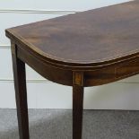 A George III mahogany fold over card table, width 3'