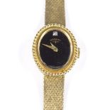 A lady's 9ct gold cased Rotary Mechanical wristwatch, with diamond set face and textured mesh