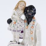 A Victorian Staffordshire anti-slavery figure of Uncle Tom, height 26cm