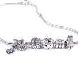 A Pandora silver necklace, with 6 charms, length 430mm