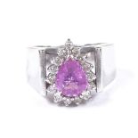 A 14ct white gold pink sapphire and diamond cluster ring, pear-shaped corundum approx 1.13ct,