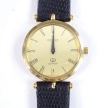 A Gucci Quartz wristwatch, gold plated case, champagne dial with ribbed black enamel case and