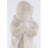 An early 20th century carved alabaster sculpture of a young girl in a raincoat, signed P Sandy?,