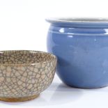 A Chinese blue glaze porcelain miniature jardiniere, diameter 13cm, and a crackle glazed bowl (2)