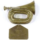 An Antique Buglet brass military bugle, by H Keat & Sons of London, length 18cm, and a Grenadier