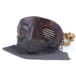A First War Period tank crew mask, leather covered steel upper part with chain link lower guard