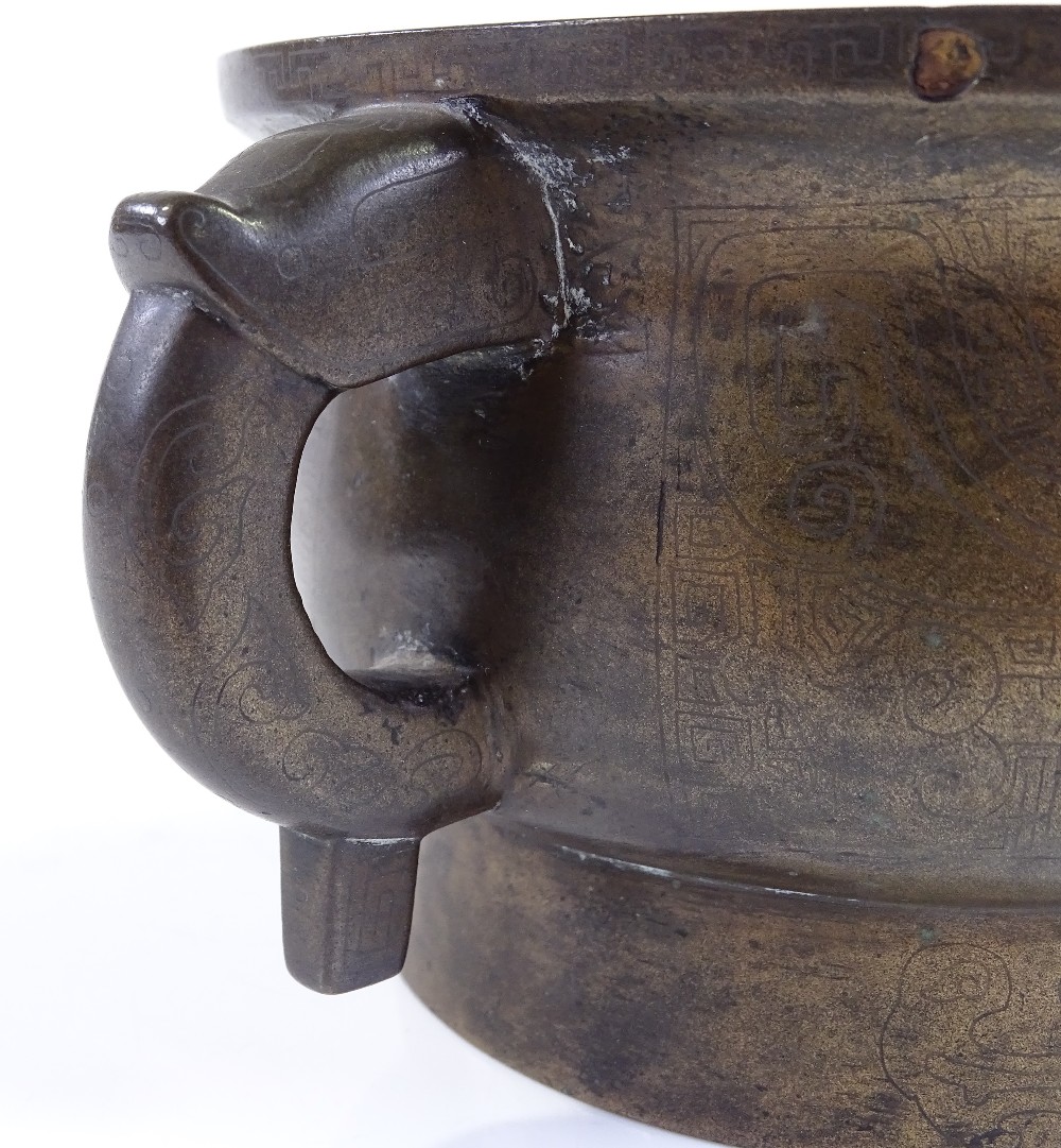 A Chinese cast-bronze 2-handled incense burner with engraved geometric designs, rim diameter 12cm, - Image 3 of 13