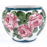 A Wemyss Pottery jardiniere with hand painted rose decoration, impressed and painted marks under