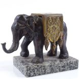A bronze elephant on marble base, height 11cm