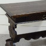 An Antique Tuscan walnut side table, with carved frieze drawer and carved stretcher base, 3'3" x