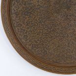 A Cairo Ware copper and silver inlaid tray, diameter 60cm