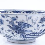 A Chinese blue and white porcelain bowl, with enamel phoenix design, diameter 20cm