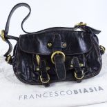 A Francesco Biasia dark brown leather handbag with brass mounts, with dust bag