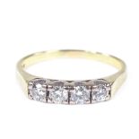 An 18ct gold 4-stone diamond half-hoop ring, total diamond content approx 0.4ct, setting height 3.