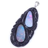 An unmarked silver black opal and composition pendant, height excluding bale 43.7mm, 5.7g
