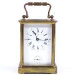A 19th century French brass-cased carriage clock, with 8-day striking movement, case height 11cm, in