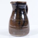 A David Leach Lowerdown Studio Pottery Tenmoku glaze jug, impress marks, height 17cm