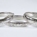 5 various engraved silver hinged bangles, 82.2g total