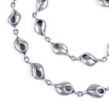 A Danish sterling silver matching necklace and bracelet set, of stylised panel design by Bernhard