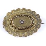 A Victorian unmarked gold rose-cut diamond set panel brooch, with rope twist surround and photo