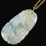 A carved jade pendant, on unmarked yellow metal chain, panel height 40.8mm, chain length 440mm, 12.