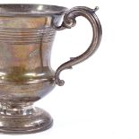 A Victorian silver thistle-shaped mug, with reeded neck and rim, hallmarks London 1838, height 10.