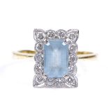 An 18ct gold aquamarine and diamond cluster panel ring, emerald-cut aquamarine approx 1.2ct, setting