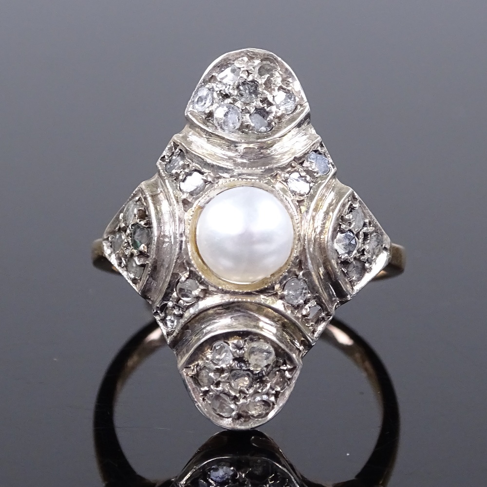 An unmarked gold pearl and rose diamond panel dress ring, panel height 24.5mm, size P, 4.7g