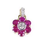 An 18ct gold ruby and diamond cluster pendant, with diamond set bale, height 14.7mm, 1.8g