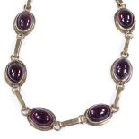 A 14ct gold cabochon garnet bracelet, length 185mm, 9.3g