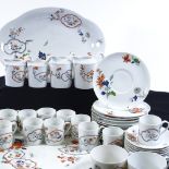 A Limoges Christian Dior Imari pattern tea service, including 6 various jugs and 2 trays