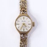 A lady's 9ct Accurist Mechanical wristwatch, 21 jewel movement with abstract 9ct strap, case width