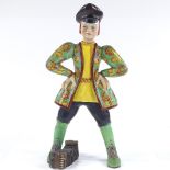 A Lenchi Pottery figure of a boy with an accordion, inscribed Janetti, height 40cm