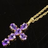 A 9ct gold amethyst cross pendant, on 9ct chain, pendant height excluding bale 30.9mm, chain