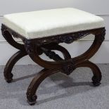 A 19th century walnut X-framed dressing stool, with acanthus carved decoration, 21" x 15"