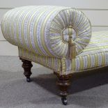 A Victorian upholstered chaise longue on turned feet
