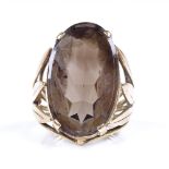 A large 14ct gold smoky quartz tablet ring, setting height 22.9mm, size F, 6.1g