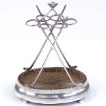 An Edwardian silver golf design pen holder, with mesh blotter tray base, by Joseph Rodgers & Sons,