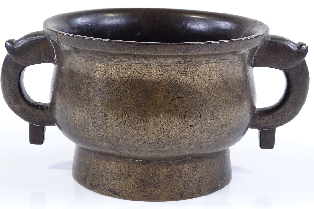 A Chinese cast-bronze 2-handled incense burner with engraved geometric designs, rim diameter 12cm, - Image 2 of 13