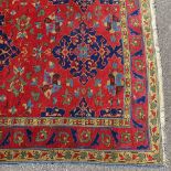 A handmade Antique Caucasian red ground wool rug, 8'4" x 4'9"