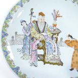 A Chinese porcelain charger, with hand painted enamel court scene, and painted seal marks,