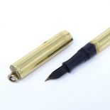 A Vintage Ideal gold plated fountain pen, length 9cm